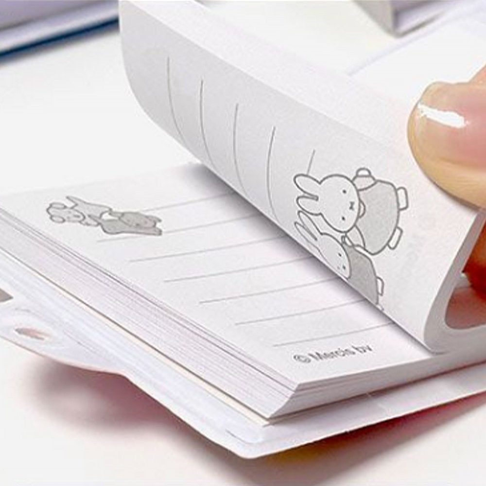 An officially licensed collection of Miffy secret mini notebooks in soft pink, light blue, blue, and grey. Each notebook features a padded cover with Miffy or Boris Bear illustrations, a silver ball chain, and a color-coordinated miniature padlock with keys.