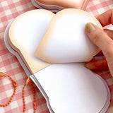Officially licensed Miffy memo pads shaped like slices of toast. The pads feature a soft tan cover with character illustrations and include orange ball chains.