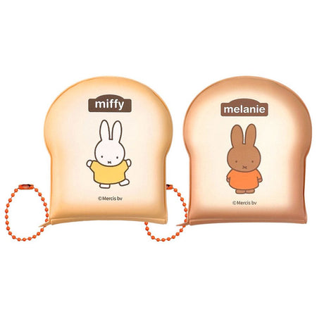 Officially licensed Miffy memo pads shaped like slices of toast. The pads feature a soft tan cover with character illustrations and include orange ball chains.