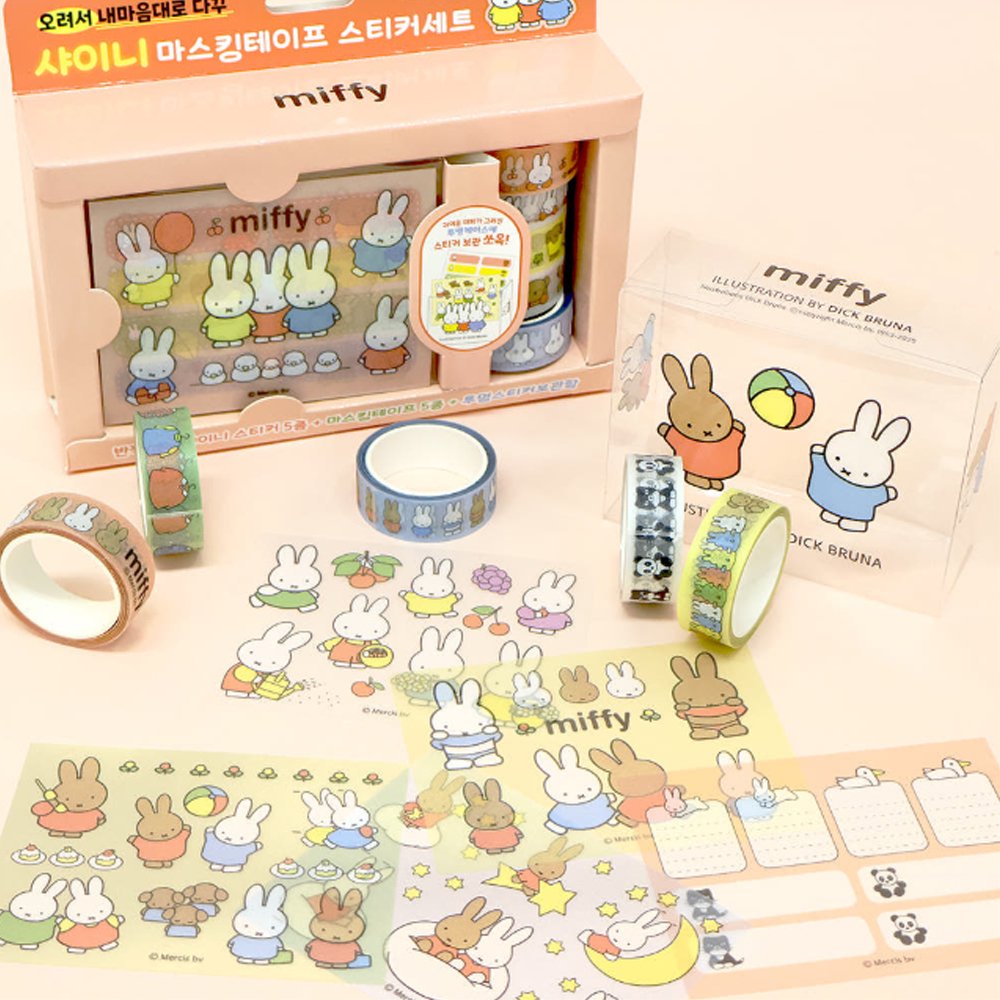 An officially licensed Miffy stationery set featuring five rolls of decorative washi tape and five shiny sticker sheets displayed with a transparent storage case. The collection showcases classic Dick Bruna illustrations of Miffy the rabbit and friends in soft pastel colors.
