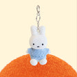 Four officially licensed Miffy plush keychains wearing knit sweaters in orange, green, light blue, and dark blue standing together. Each plush includes an attached silver chain with a lobster clasp at the top.