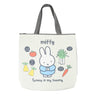 An officially licensed Miffy canvas tote bag with zipper closure, the bag shows Miffy surrounded by vegetables like carrots and leeks with "Yummy in my Tummy" text.