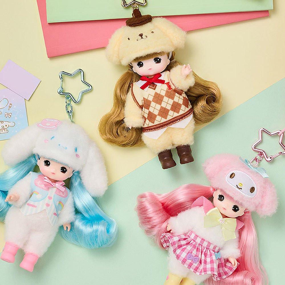 Officially licensed Sanrio and Little Mimi Collaboration Doll Keychain Collection featuring My Melody, Cinnamoroll, and Pompompurin each wearing a character theme hat and attached to a star shaped metal clasp, ideal for adult kidult collectors as a cute aesthetic backpack charm or nostalgic collectible accessory.