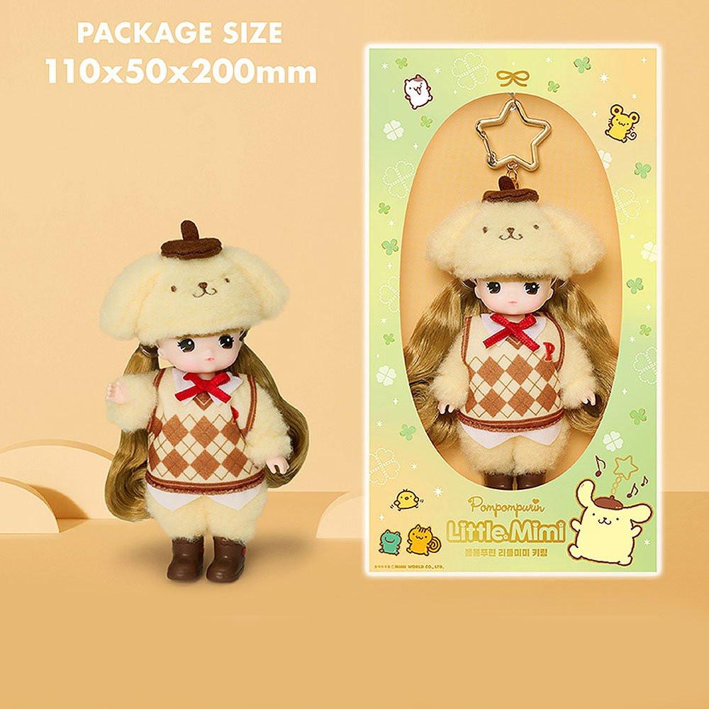 Officially licensed Sanrio and Little Mimi Collaboration Doll Keychain Collection featuring a blonde mini doll wearing a fuzzy yellow Pompompurin plush hat with a tiny brown beret, a brown and cream argyle patterned knit vest over a soft yellow top with a red ribbon bow collar, and brown boots, attached to a gold star shaped metal clasp, ideal for adult kidult collectors as a cute aesthetic backpack charm or nostalgic collectible accessory.