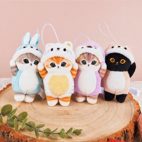 An officially licensed Mofusand plush cat keychains each featuring a cat with big eyes wearing an animal costume.