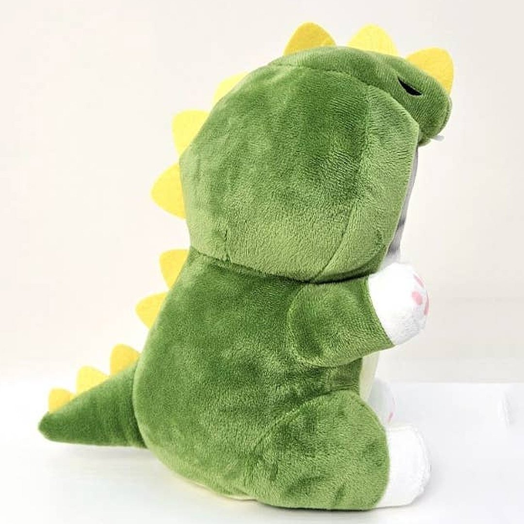 This adorable Mofusand cat is dressed in a dinosaur costume Perfect for Mofusand fans, this plush combines playful charm with cozy cuteness. It's a must-have addition for collectors and those who love unique and fun plushies!