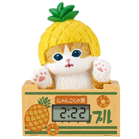 Mofusand blind box miniature clock, a collectible cat figure in a pineapple costume, ideal for kawaii Japanese stationery and desk accessories.