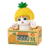 Mofusand blind box miniature clock, a collectible cat figure in a pineapple costume, ideal for kawaii Japanese stationery and desk accessories.