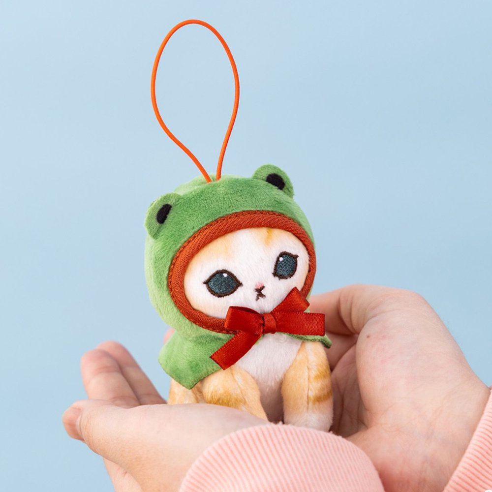 An officially licensed Mofusand plush mascot keychains of three kittens, each wearing a frog hood with a bow