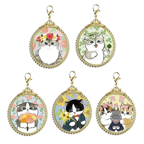 A set of five officially licensed Mofusand metal keychains featuring round, gold-framed illustrations of cats. The designs show various cats with flower crowns, veils, and bouquets in a charming, soft-colored art style.
