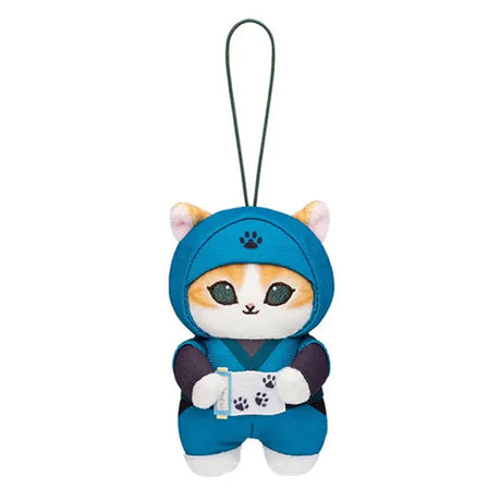 An officially licensed Mofusand Ninja Plush Keychain featuring a white/yellow cat in a green ninja suit and hood with a paw print logo, holding a white scroll with paw prints