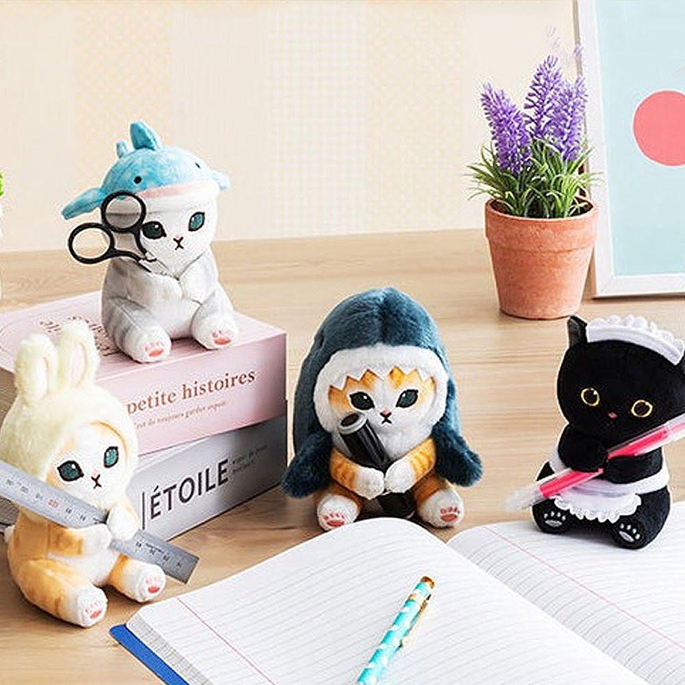 A soft Mofusand whale shark cat plush featuring a white and grey kitten wearing a light blue spotted whale shark hat