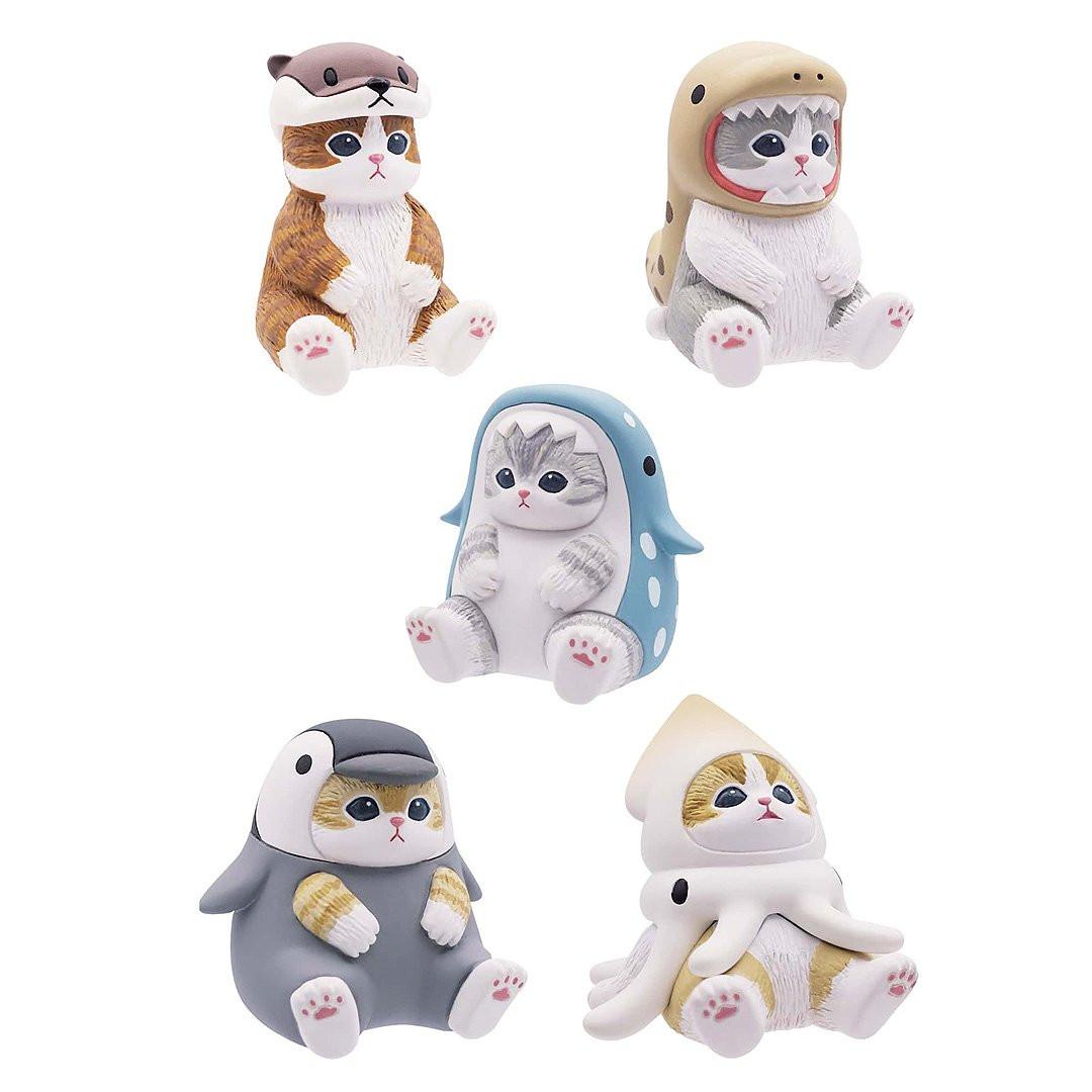 An officially licensed collection of five Mofusand aquatic animal figurines featuring kittens dressed in cute sea creature suits, including an otter, shark, whale shark, penguin, and squid
