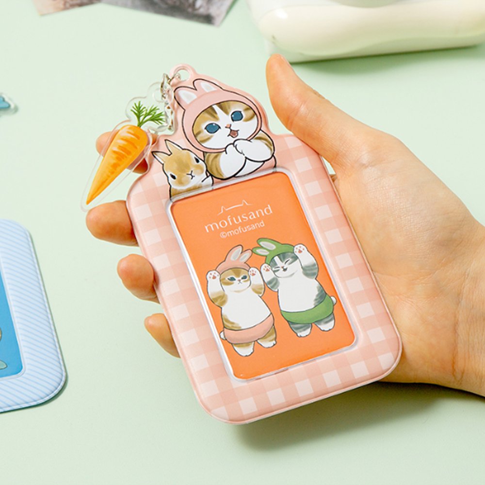 Officially licensed Mofusand collection of three ID card holder keychains featuring cute cat illustrations with matching acrylic charms and secure metal clasps