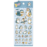 A sheet of officially licensed Mofusand stickers featuring various cats dressed in shark costumes, organized by size from XL at the top to small at the bottom