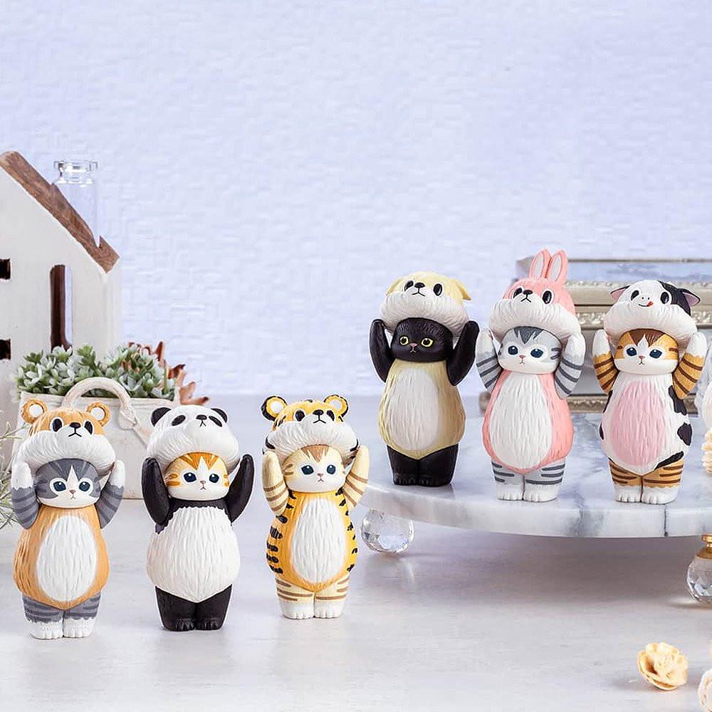 A set of six mofusand collectible cat figurines featuring kittens dressed in adorable animal suits including a panda, cow, tiger, rabbit, bear, and dog.
