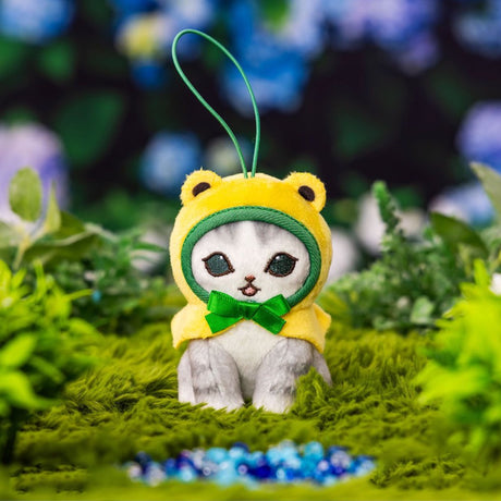 An officially licensed Mofusand plush mascot keychain featuring a small grey cat wearing a yellow frog-themed hood with a red bow