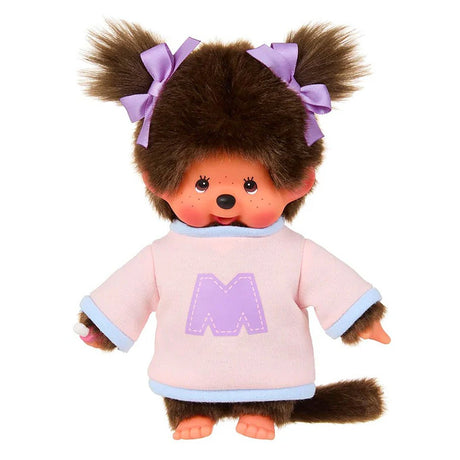 Official Licensed, Monchhichi is wearing two-tone sweater in pink and blue, complete with a bold purple “M” on the front and matching purple ribbon bows in her pigtails . perfect for decorating or gift.