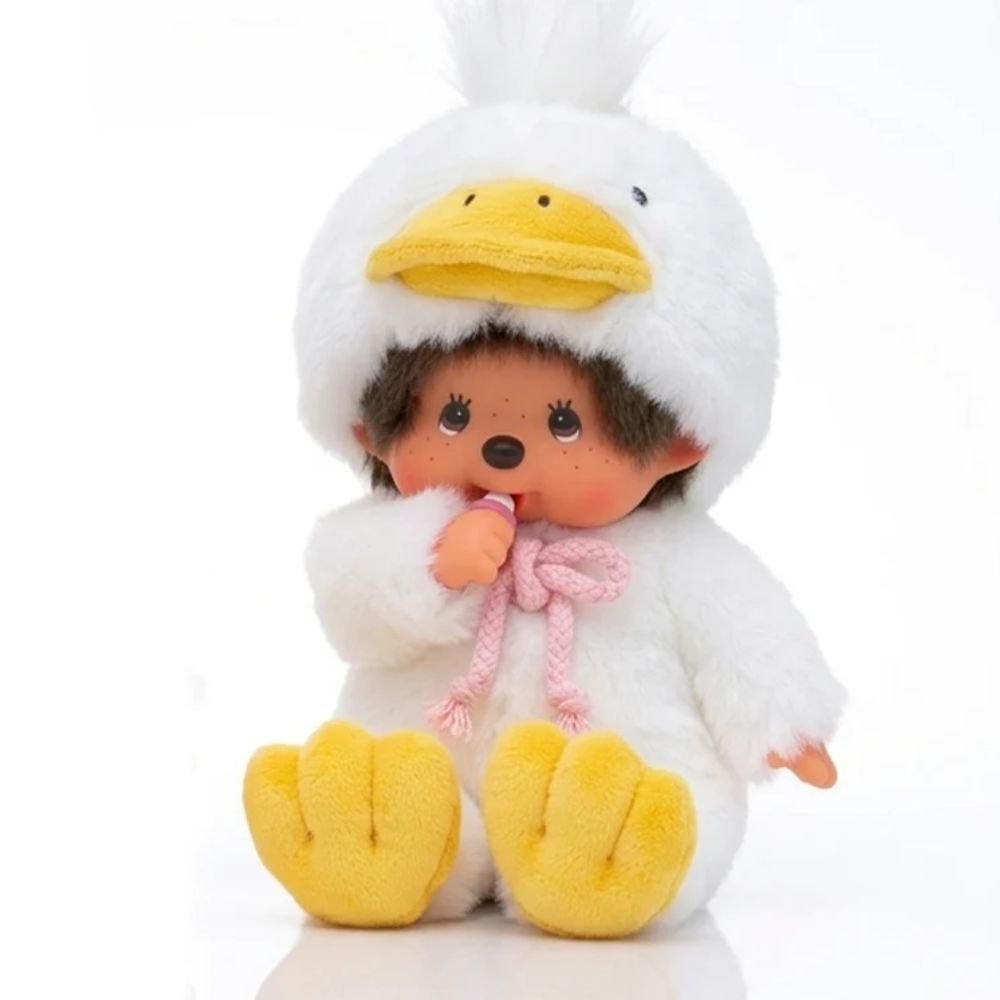 Front sitting view of Officially Licensed Sekiguchi Monchhichi Fluffy Sitting Duck 8 Inch Plush Doll in white duck costume with yellow duck beak hood and yellow webbed feet, perfect Christmas gift and holiday present for Monchhichi collectors