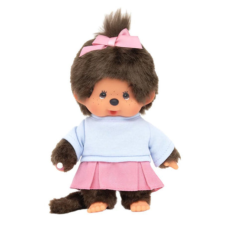 Official Licensed Monchhichi: She is wearing a cute pink pleated skirt, complemented by a matching ribbon in her hair and a soft pastel top
