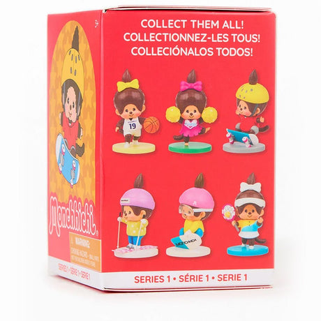 Box of collectible Monchhichi figures with cartoon characters on a red background