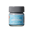 A 40ml glass jar of Mr. Hobby Aqueous Surfacer 500, a water-based gray liquid primer for plastic models.