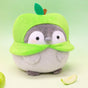 Officially licensed Spiralcute Koupen Chan green apple costume plush toy featuring a cute round grey penguin with rosy cheeks, soft fleece texture, and a felt leaf stem on its head, serving as a comforting desktop healing companion for adult and kidult collectors.
