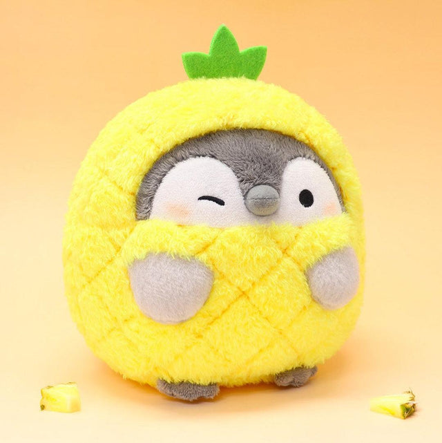 Officially licensed Spiralcute Koupen Chan 6" Pineapple plush featuring the grey positive penguin in a vibrant yellow pineapple costume with green felt leaves. A premium, high-quality Japanese character mascot for adult kidult fans.