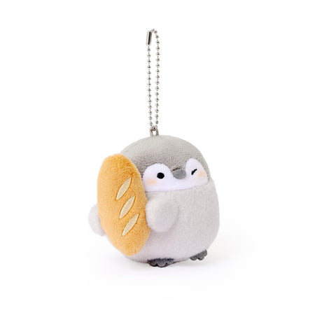 Officially licensed Spiralcute Koupen Chan Baguette Costume Plush Mascot Keychain featuring a soft grey penguin holding a baguette, attached to a sturdy silver ball chain, perfect for kidult bag charms and kawaii aesthetic backpack accessories.