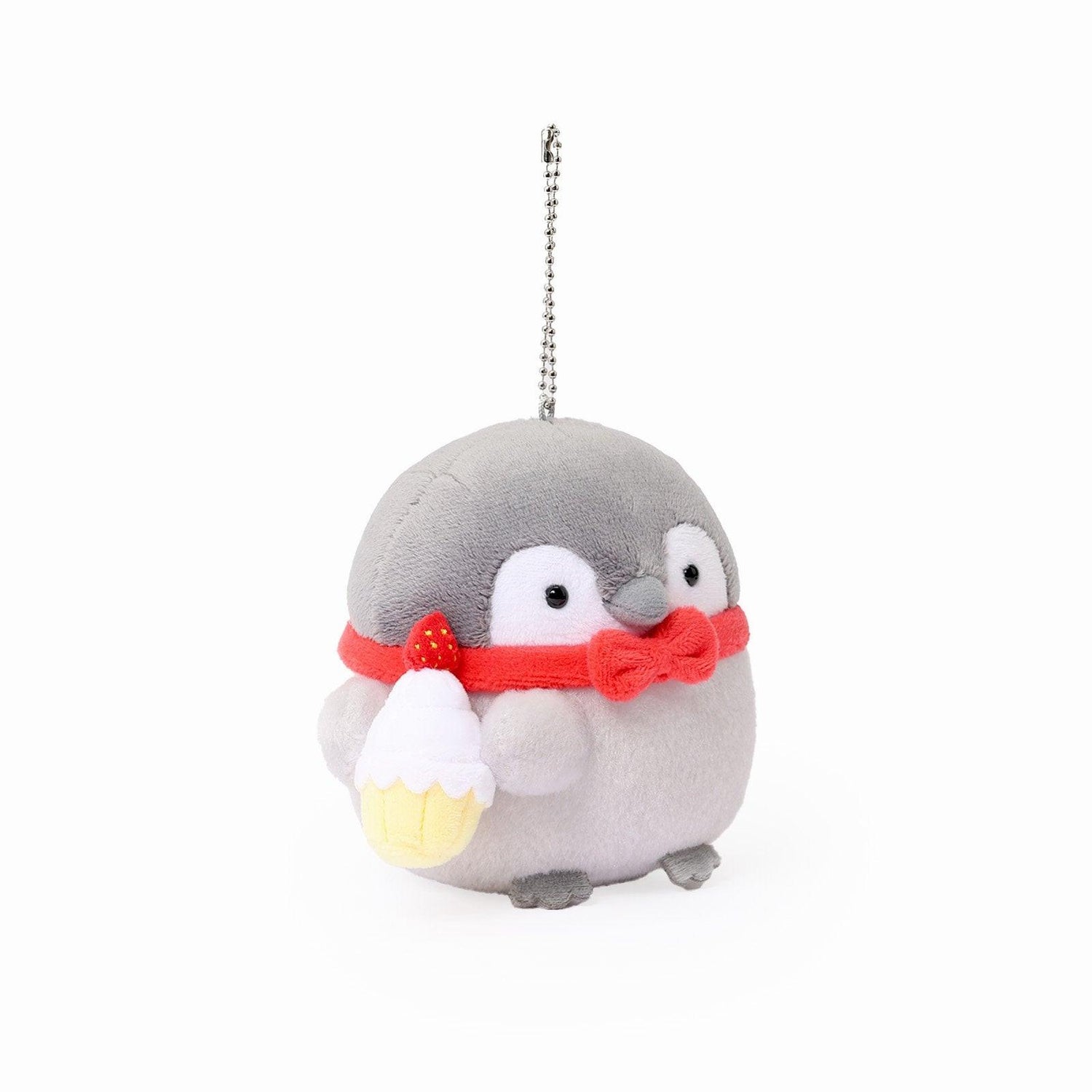 Officially licensed Spiralcute Koupen Chan Bakery Series plush mascot keychain featuring the cute grey penguin wearing a bright red bow tie and holding a miniature strawberry cupcake, with a silver ball chain, made of soft fuzzy material for adult kidult collectors as a kawaii aesthetic bag accessory or collectible plush charm.