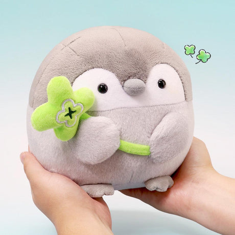 Official Spiralcute Koupen Chan Plush with a Four-Leaf Clover Wand; featuring the positive penguin mascot held in hand. A premium lucky charm gift for adult mental wellness, perfect for new job celebrations, graduation gifts, and office-core healing decor. Symbolic "good luck" gift for dedicated collectors and Y2K aesthetic lovers.