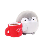 A thoughtful "cheer up" gift for coworkers and friends: Koupen Chan holding a warm red mug. Symbolic of comfort and care, this positive penguin mascot is an ideal birthday surprise or self-care reward for a balanced lifestyle.