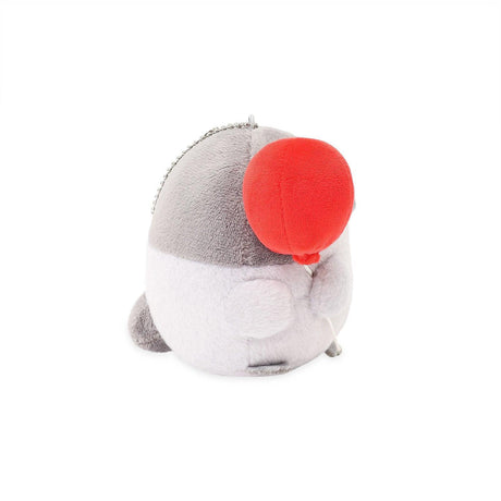 Minimalist office-core deskterior Koupen Chan plush with a red balloon. A cute workplace healing accessory and mental wellness tool for adult collectors seeking a cozy, Y2K nostalgic aesthetic desk setup and emotional comfort. Official licensed, Spiralcute. 