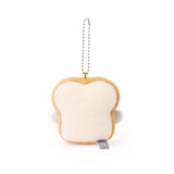 Officially licensed Spiralcute Koupen Chan Baker Costume Plush Mascot Keychain featuring a soft grey penguin embedded in a soft slice of bread with a yellow butter square detail, attached to a sturdy silver ball chain, perfect for kidult bag charms and kawaii aesthetic backpack accessories.