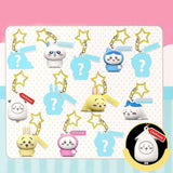 Collection of cute Chiikawa, Hachiware, Usagi and Momoga figure keychains on a display card with a pink background.