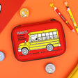 Officially licensed Peanuts hard shell pencil cases in yellow, red, pink, and grey featuring Snoopy, Charlie Brown, and friends