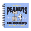 An overhead shot showing officially licensed Peanuts spiral notebooks in blue, showcasing the different vintage-inspired cover design and black spiral binding.