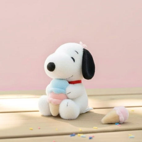 Officially licensed Peanuts Plush Snoopy keychain in a seated pose, holding a colorful ice cream cone