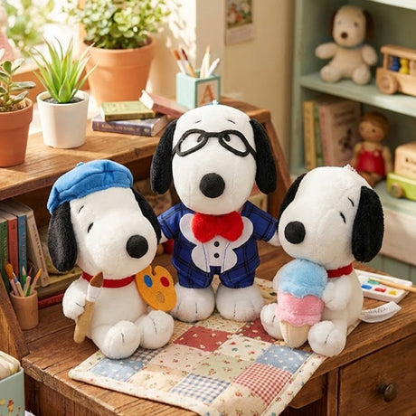 An officially licensed collection of Peanuts Plush Snoopy keychains in a variety of poses and holding props, including ice cream, wearing a cape, and holding art supplies.