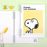 Three officially licensed Peanuts line notebooks with translucent covers in soft hues of pink, yellow, and green, each featuring a large illustration of Snoopy. The interior view shows 8mm ruled pages with small Snoopy graphics at the top and bottom corners.
