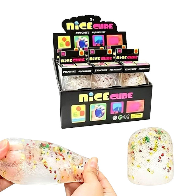 Nice Cube clear squishy fidget toy shown being stretched between two hands next to an uncompressed cube squishy toy