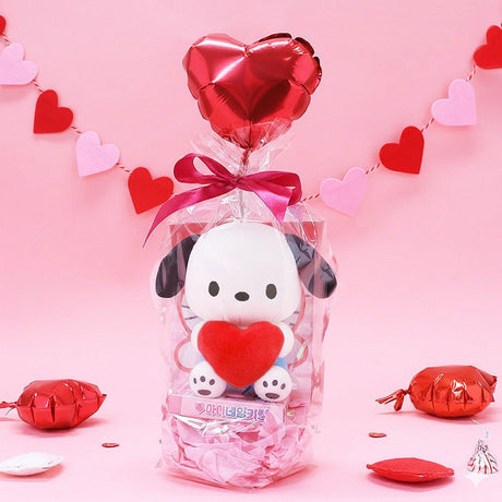 Official Sanrio Pochacco Valentine's Day Plush Gift Set in a clear ribbon package with a red heart balloon. Includes a small Pochacco holding a pink heart and a collectible themed box, perfect for Kawaii aesthetic gift ideas.