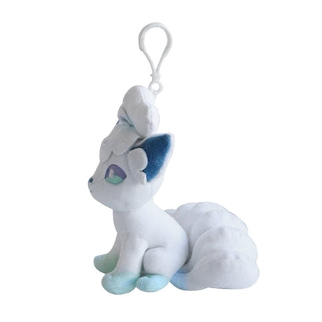 Plush keychain of Alolan Vulpix, a white and light blue fox Pokémon with curly fur on its head and multiple tails, featuring a white plastic clip for attachment.