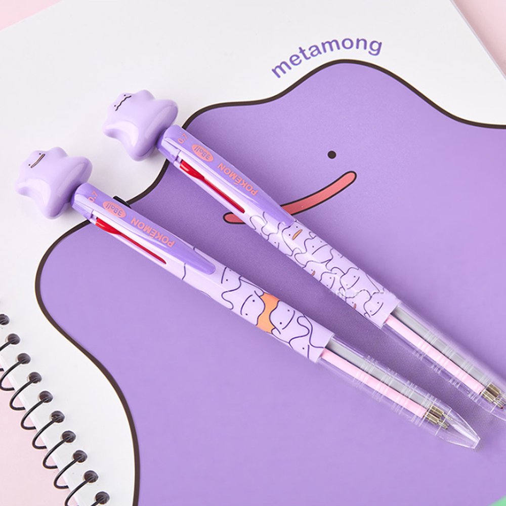 An officially licensed purple Pokemon 3-color ballpoint pens featuring a 3D Ditto character topper and a 0.7mm tip, decorated with various Ditto expressions on the barrel.
