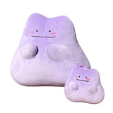 An officially licensed Pokémon Ditto plush toy and plush keychain in a vibrant light purple color, featuring a simple smile, and three pink diagonal lines on each cheek to represent blushing.