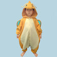Child wearing a Dragonite onesie against a light blue background