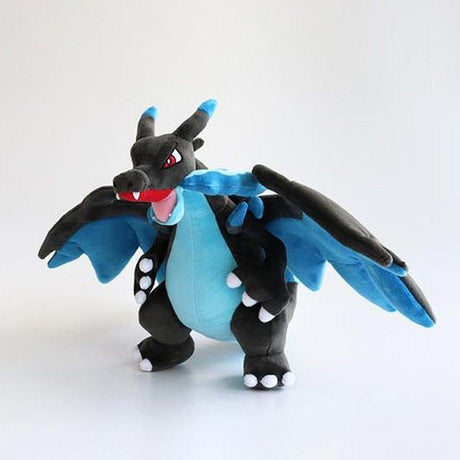 Office Licensed. Pokemon Mega Charizard plush toy of a dragon-like creature with blue wings and black body on a white background. Perfect for  displaying, or gifting Christmas to Pokemon fans of all ages.