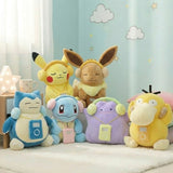 An officially licensed Pokemon plush collection featuring Pikachu, Eevee, Snorlax, Squirtle, Ditto, and Psyduck each sitting upright with a plush headset and a plush music player