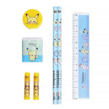 Two officially licensed Pokemon "Pokepeace" stationery gift sets side-by-side. The sets include two pencils, a ruler, a sharpener, an eraser, and two pencil caps.