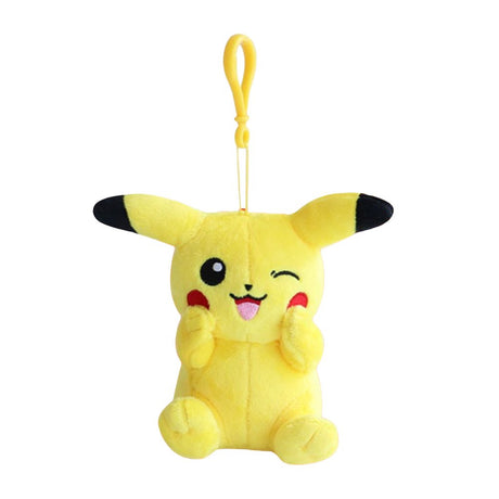 An officially licensed winking Pikachu plush keychain clip against a white background. The small, yellow stuffed Pokemon is sitting while holding its paws to its red cheeks, featuring a yellow plastic hanging clip attached to its head.